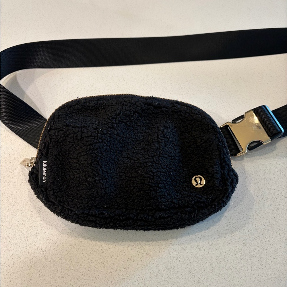 Lululemon black and gold belt bag/crossbody bag